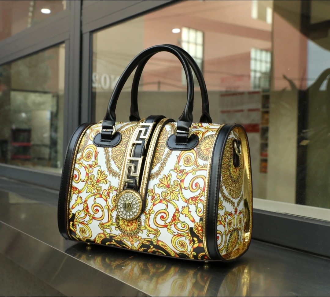 Medallion Baroque Boston Bag in Baroque Gold